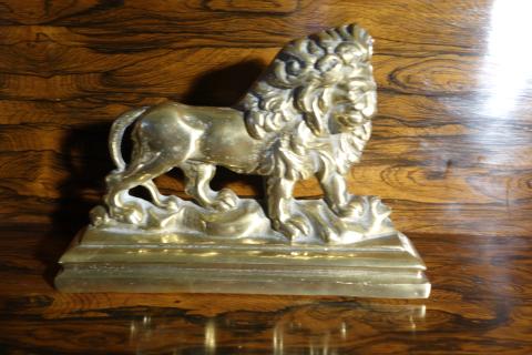 Victorian brass lion doorstop.